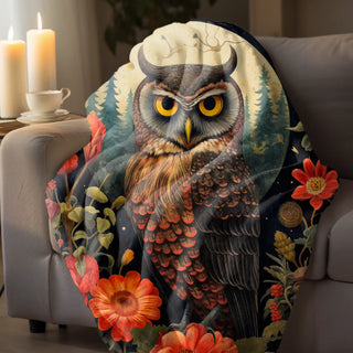 Owl with flower and candle on couch in Blankets collection