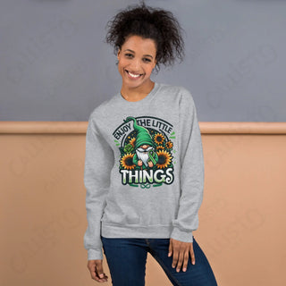 Woman wearing grey crewneck sweater with sunflowers design from Women’s Crewneck Sweaters collection.